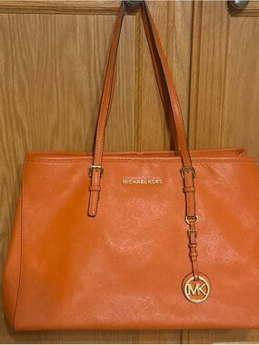 Michael Kors Vibrant Orange Saffiano Leather Tote with MK Charm
